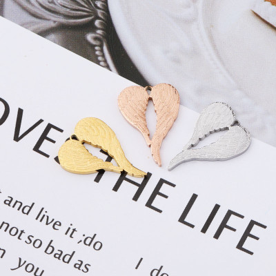 Heart pendant with wings in three color combinations made of surgical steel