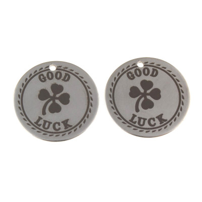 Round pendant with engraved GOOD LUCK inscription in the middle of surgical steel