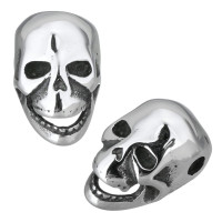 

Surgical steel bead mask in the form of a skull 

