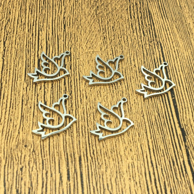 Surgical steel flying bird pendant