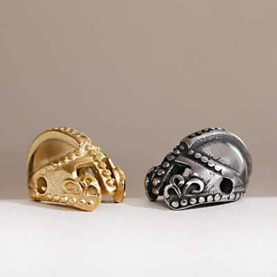 Bead knight's helmet decorated with surgical steel ornament