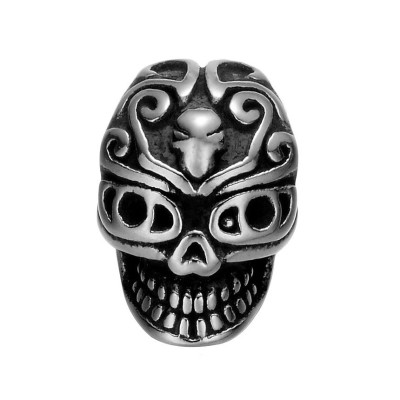 Skull with surgical steel ornament