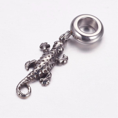 Eyelet with pendant lizard surgical steel