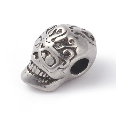 Bead skull with surgical steel ornaments