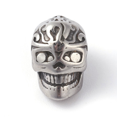 Bead skull with surgical steel ornaments