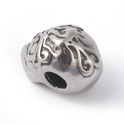 Bead skull with surgical steel ornaments