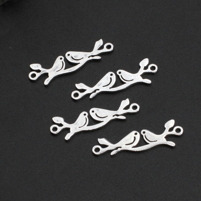 Konektor ptáčci sedící na větvičce chirurgická ocel