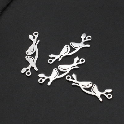 Connector birds sitting on a twig of surgical steel