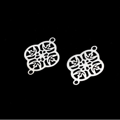 Connector ornament with surgical steel flowers in two color combinations