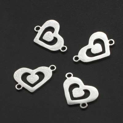 Heart connector with a small heart in the middle of surgical steel