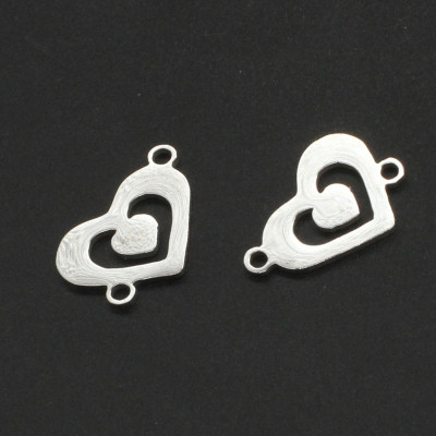 Heart connector with a small heart in the middle of surgical steel