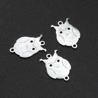 Owl connector two color variants of surgical steel