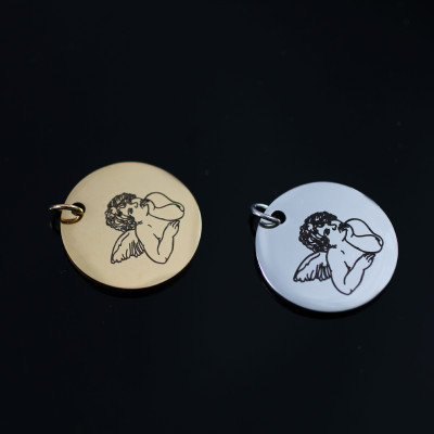 Pendant with surgical steel angel