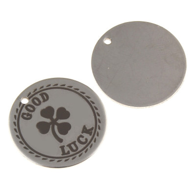 Round pendant with engraved GOOD LUCK inscription in the middle of surgical steel