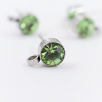 Puseta with a chaton of peridot color made of surgical steel
Preciosa Maxima SS24 chateau