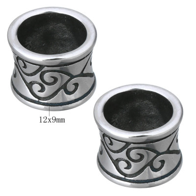 Bead with surgical steel ornaments