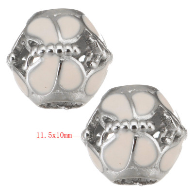 Bead with large draw-through cut bow tie with pink enamel surgical steel