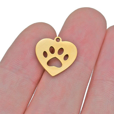 Heart-shaped pendant with a paw made of surgical steel two color combinations
