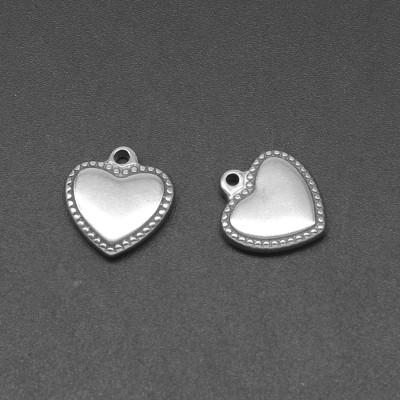 Heart pendant with decorative surgical steel edges