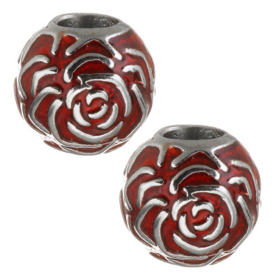 Red bead decorated with surgical steel rose shaped ornaments