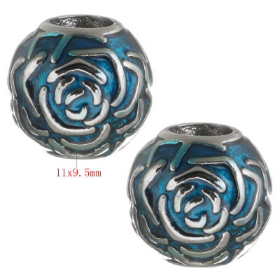 Red bead decorated with surgical steel rose shaped ornaments