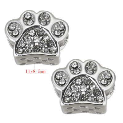 Paw-shaped bead decorated with rhinestones made of surgical steel