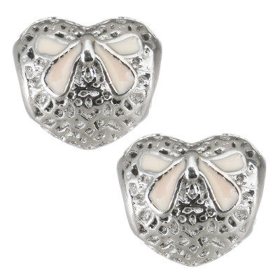 Heart with red bow from surgical steel