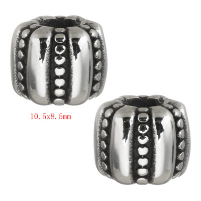 Large bead decorated with surgical steel strips