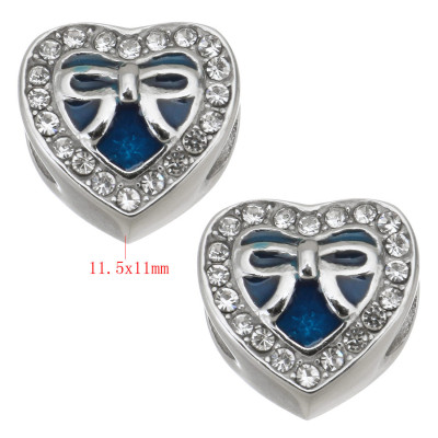 Heart bead with bow in two color combinations of surgical steel