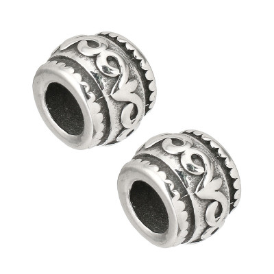 Bead with surgical steel ornaments