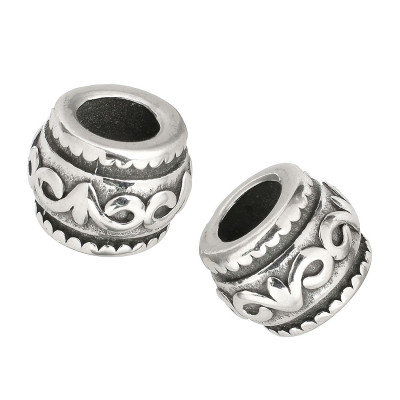 Bead with surgical steel ornaments