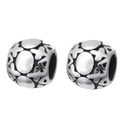 Bead with surgical steel ornaments