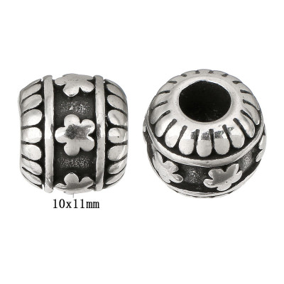 Bead with a large thread decorated with a flower of surgical steel