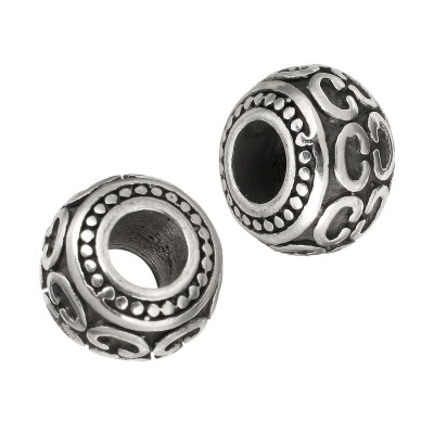 Bead with surgical steel ornament