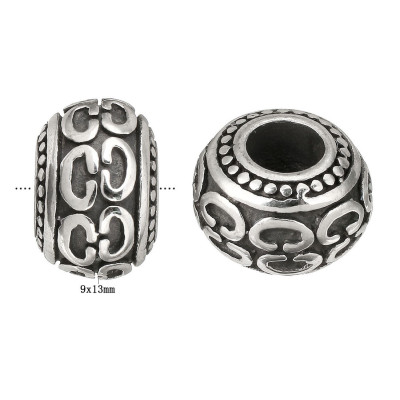 Bead with surgical steel ornament