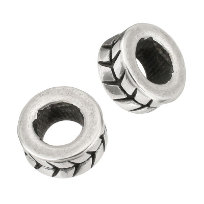 Bead decorated with surgical steel tube