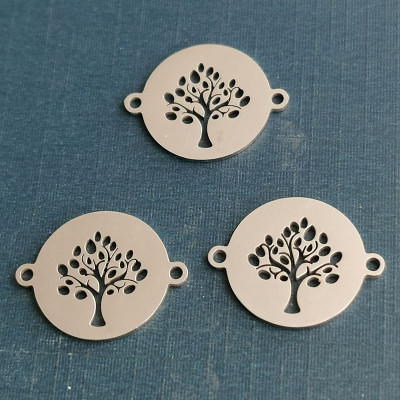 Slab connector with tree of life surgical steel