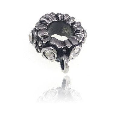 Bead with eyelet and chatons made of surgical steel