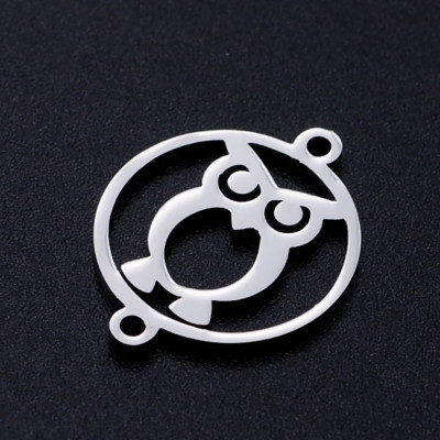 Wheel connector with owl in two color variants made of surgical steel