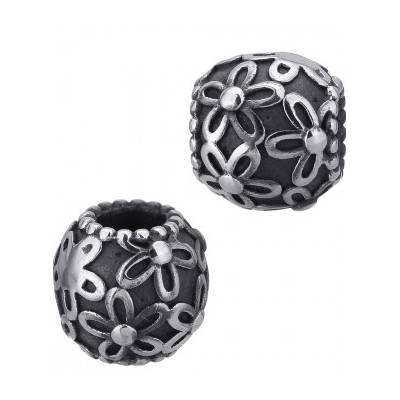 Bead with flowers on a dark background of surgical steel