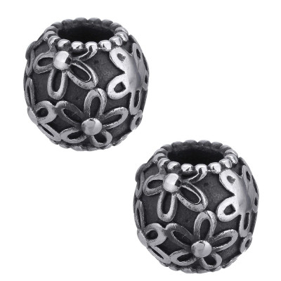 Bead with flowers on a dark background of surgical steel