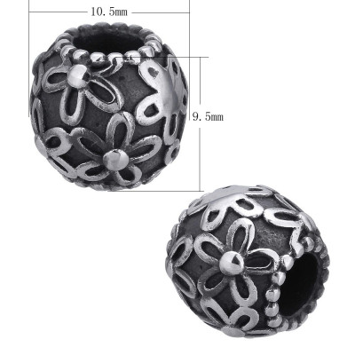 Bead with flowers on a dark background of surgical steel