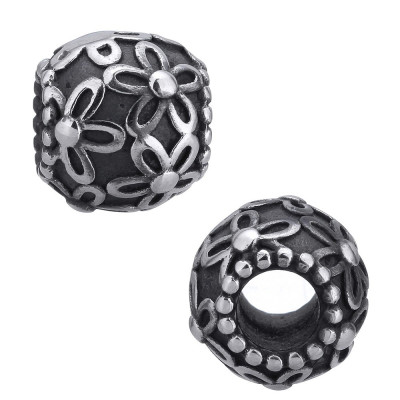Bead with flowers on a dark background of surgical steel