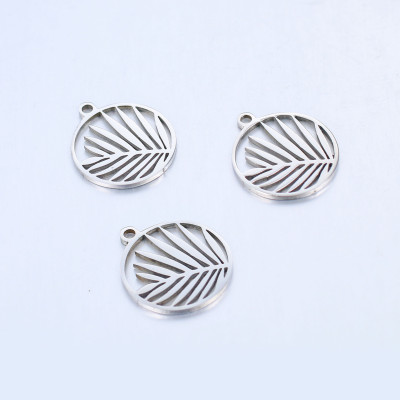 Pendant wheel with palm leaf surgical steel