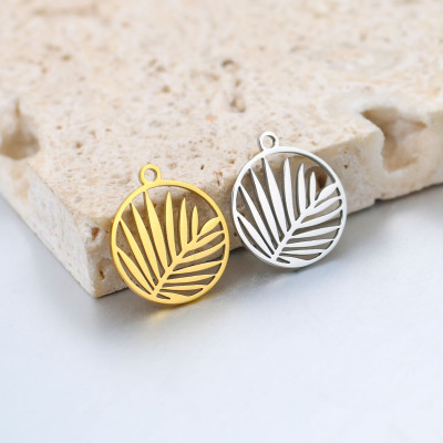 Pendant wheel with palm leaf surgical steel