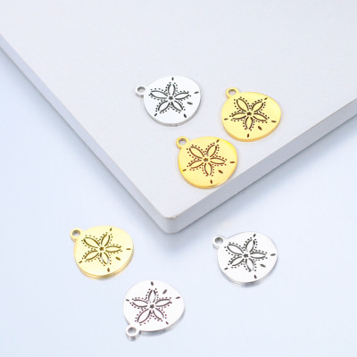 Pendant wheel with a flower, surgical steel, two color variants