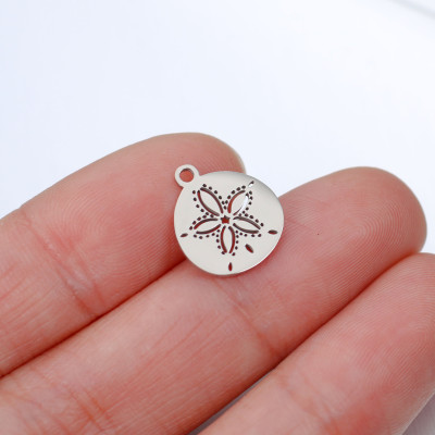 Pendant wheel with a flower, surgical steel, two color variants