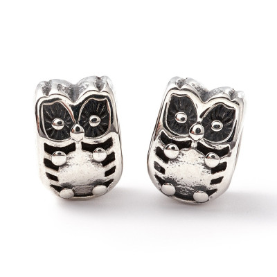 Surgical steel owl bead