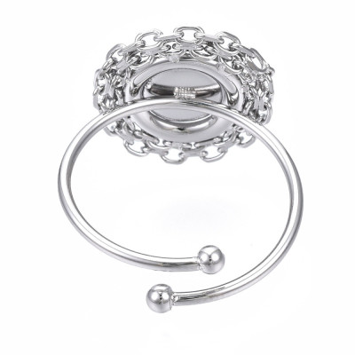 Adjustable ring with a round bowl for sticking a cabochon, surgical steel