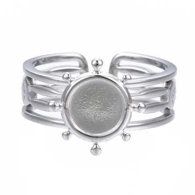 Adjustable ring with a round bowl for sticking a cabochon, surgical steel